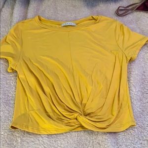 yellow tied up shirt